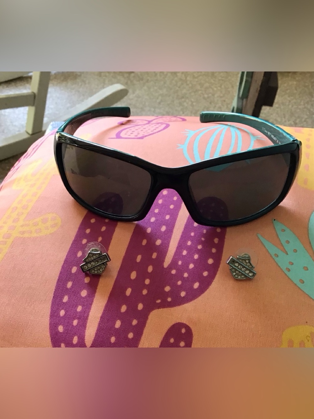 Harley Davidson sunglasses and earrings.